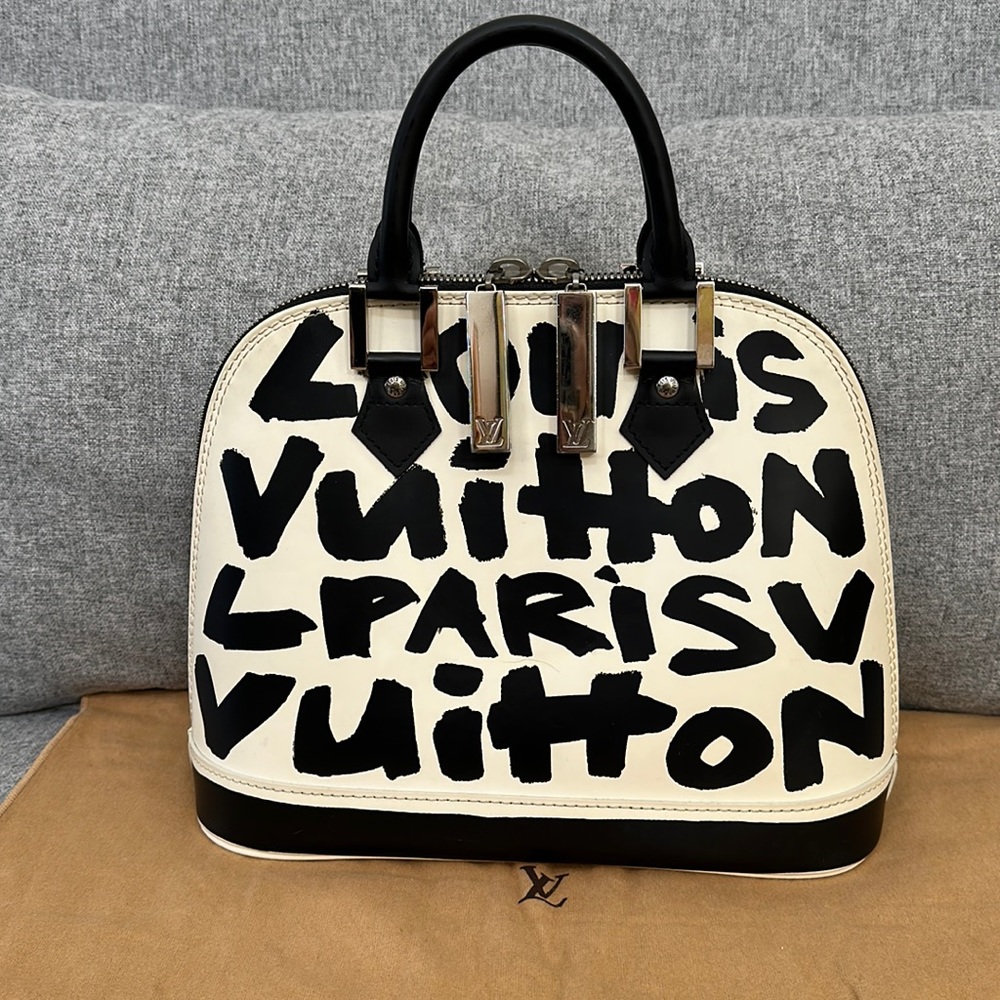LV GRAFFITI limited edition alma bag in pre-loved condition